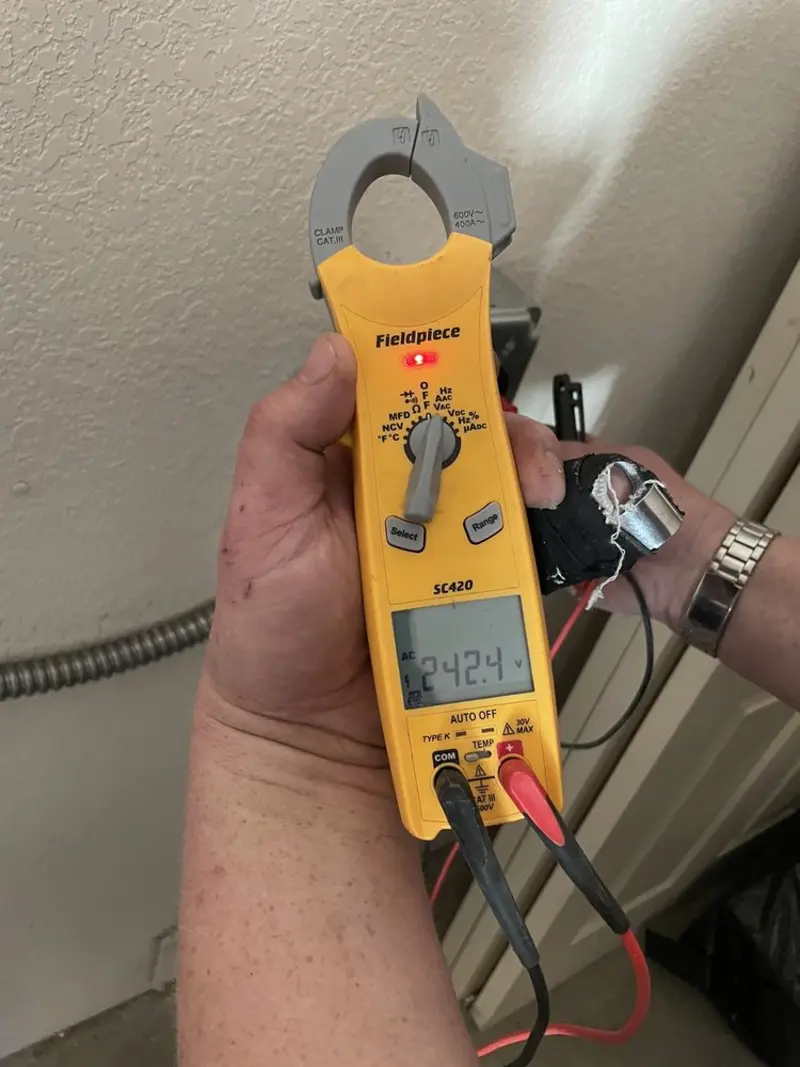 Voltage testing with clamp meter during Aluminum Wiring Replacement in Grand Rapids